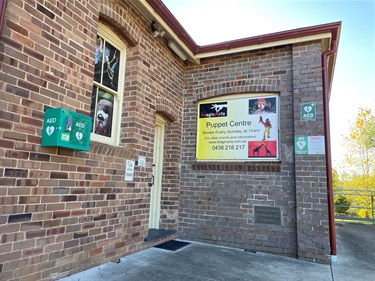 Defibrillator at entrance to Sutton Forest Hall