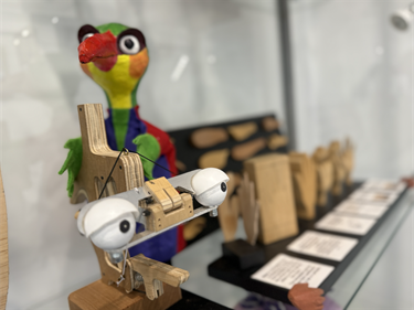 Colourful bird and other puppet paraphernalia