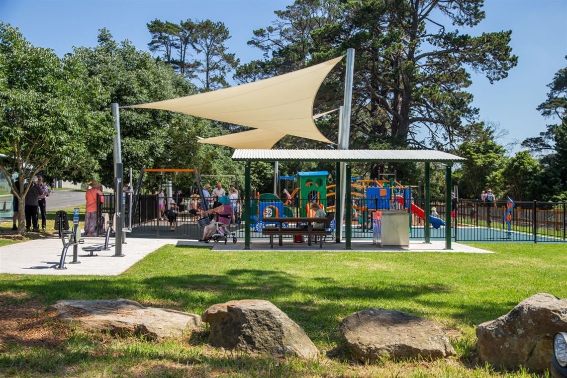 Image taken at Hill Top Community Park Openi event image of the playspace with residents enjoying the new play space