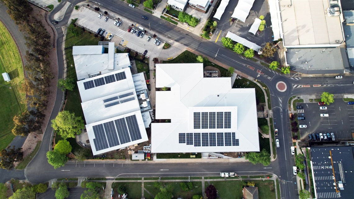 Birds eye view of Moss Vale Civic Centre and Aquatic Centre with solar panels on roof