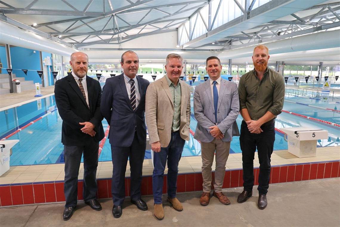 Barry Arthur - Manager Environment and Sustainability, Michael McCabe - Director Communities and Place, Hon Chris Bowen MP, James Borbone - Manager Business and Property, Mayor Jesse Fitzpatrick inside Moss Vale Aquatic Centre 