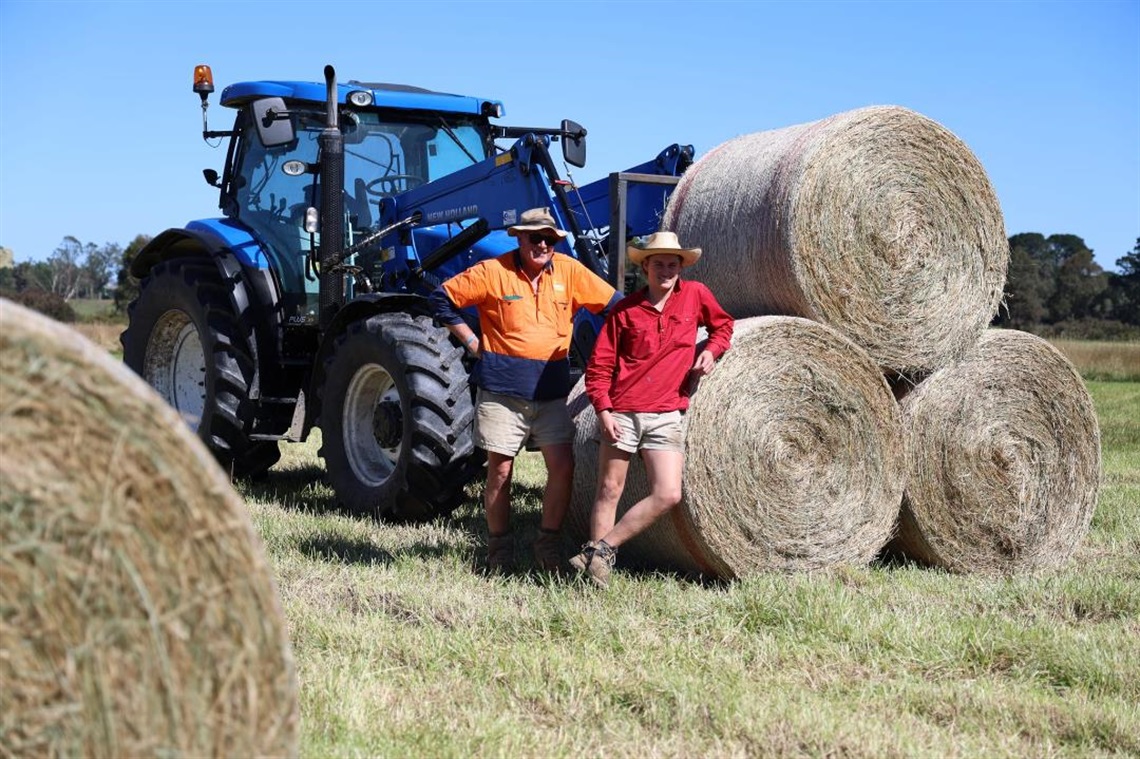 Need for Feed Volunteers with their tractor and bales