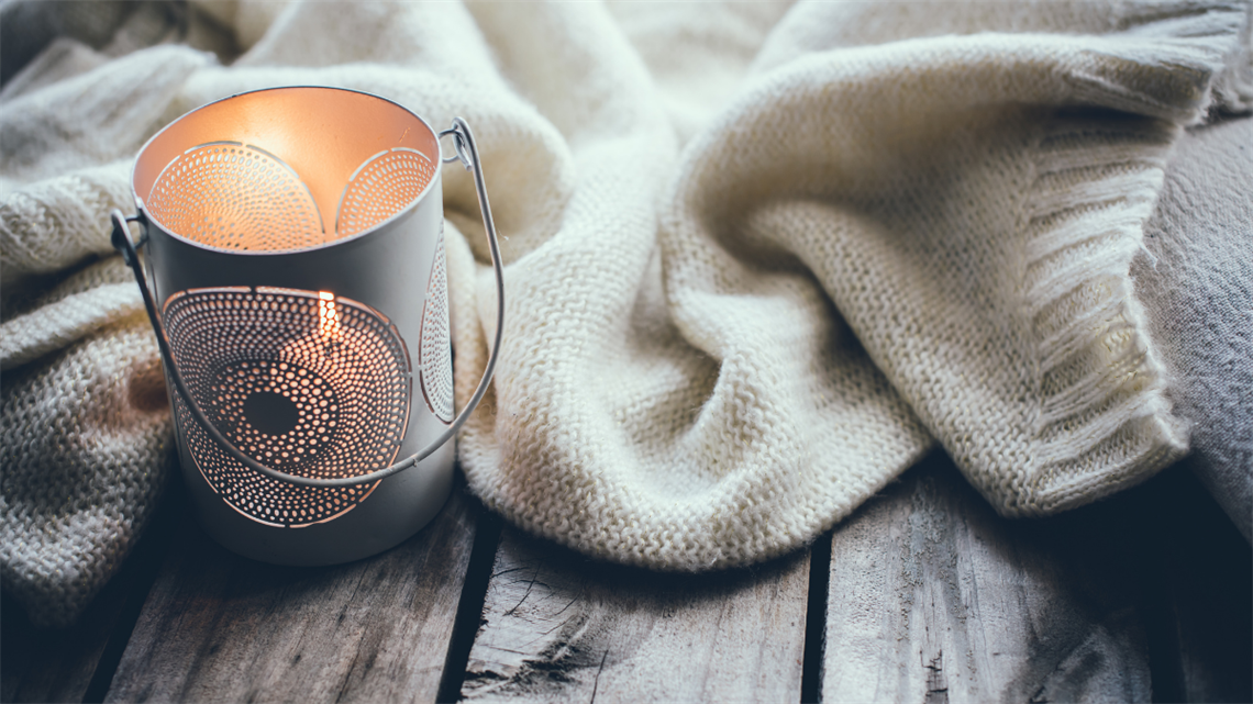 Candle and a sweater