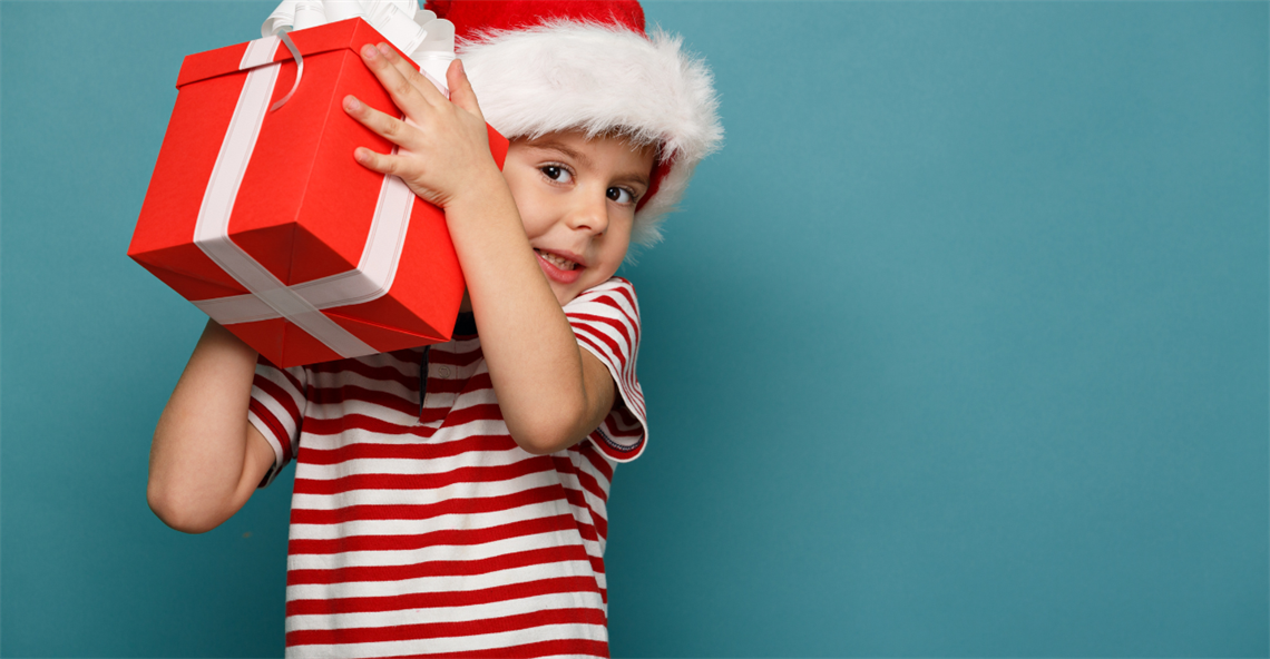 a child holding a present