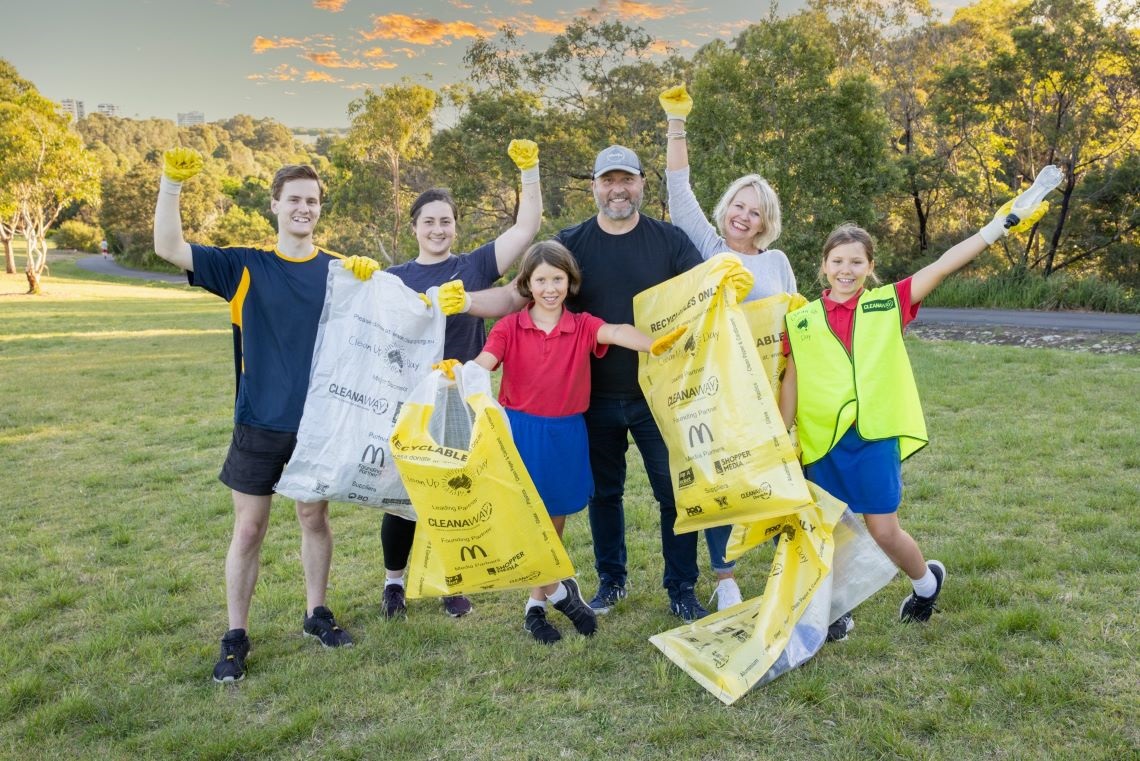 Image of residents holding Clean up Australia day bags 